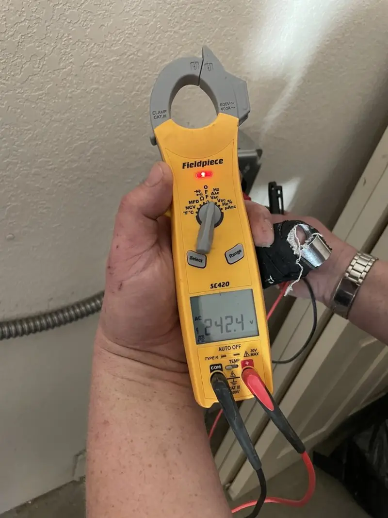 Voltage testing with clamp meter during Aluminum Wiring Replacement in Concord